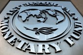 The International Monetary Fund (IMF) logo is seen outside the headquarters building in Washington, US [Yuri Gripas/Reuters]