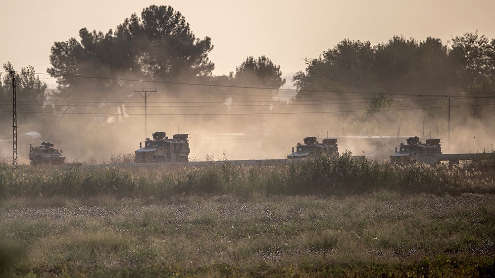Turkish army vehicles drive towards the Syrian border near Akcakale in Sanliurfa province on October 9, 2019. - Turkey launched an assault on Kurdish forces in northern Syria on October 9 with air str