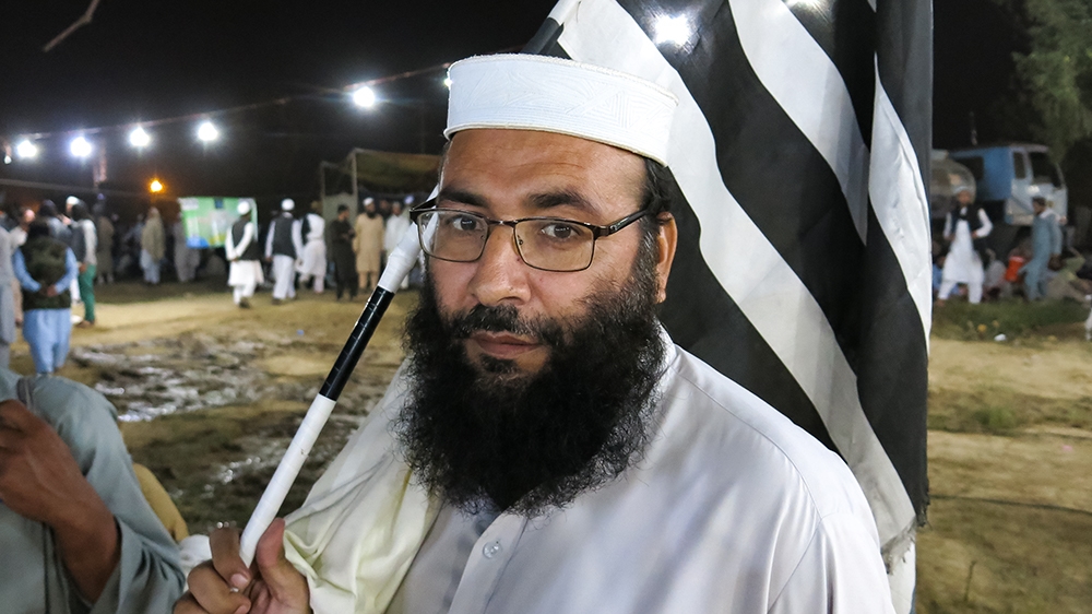 Riwayatullah, 40, travelled from Mardan to attend the protests, and says he was there because he believed the elections were rigged. [Asad Hashim/Al Jazeera]