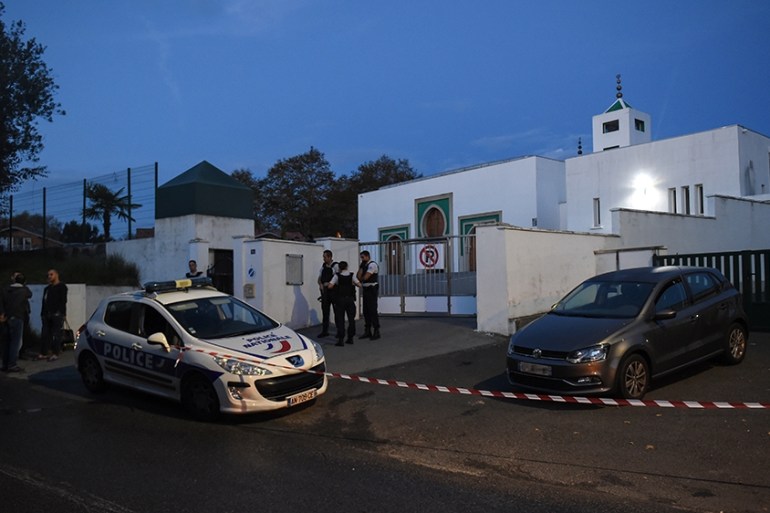 French police officers stand in front of the Mosque of Bayonne, southwestern France, on October 28, 2019, after two people were injured in a shooting. - Two people were injured on October 28, 2019 whe