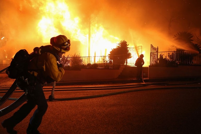 Tens of thousands evacuated as California wildfires rage