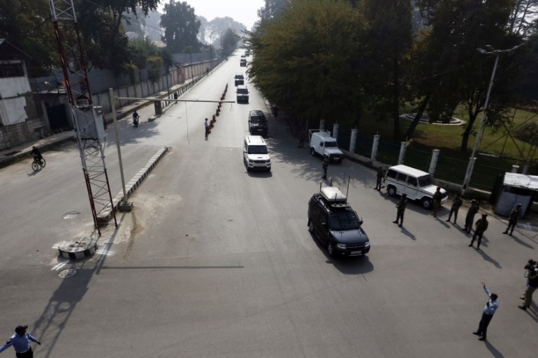 A convoy of vehicles carrying European Union lawmakers is seen after they arrived in Srinagar