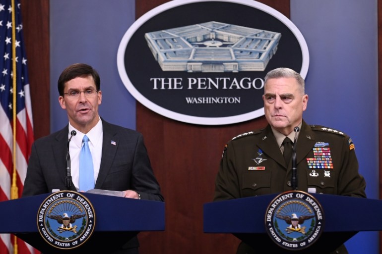 U.S. Defense Secretary Mark Esper and Joint Chiefs Chairman General Mark Milley address reporters during a media briefing at the Pentagon in Arlington, Virginia, U.S., October 11, 201