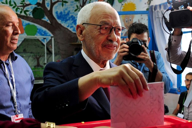 President of the Islamist party Ennahda and candidate for the Parliamentary election Rached Ghannouchi votes in a polling station south of Tunis, Tunisia, Sunday, Oct. 6, 2019. Tunisians are electing