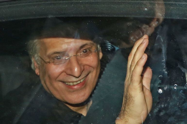 Tunisia''s presidential candidate Nabil Karoui waves at his supporters after being released from Mornaguia prison near the capital Tunis on October 9, 2019, ahead of Sunday''s runoff. - The announcement