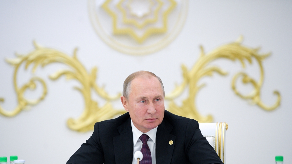 Russian President Vladimir Putin attends a meeting of heads of the Commonwealth of Independent States (CIS) in Ashgabat