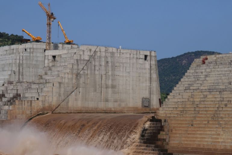 Water flows through Ethiopia''s Grand Renaissance Dam as it undergoes construction work on the river Nile in Guba Woreda, Benishangul Gumuz Region, Ethiopia September 26, 2019