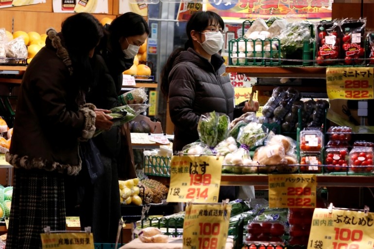 Japan shoppers in a Tokyo supermarket.