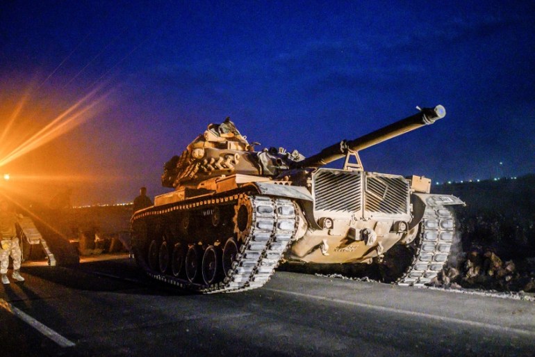 A Turkish army''s tank drives towards the border with Syria near Akcakale in Sanliurfa province on October 8, 2019. Turkey said on October 8, 2019, it was ready for an offensive into northern Syria, w