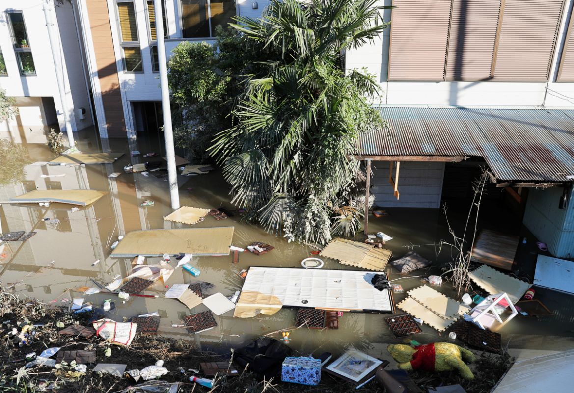 Debris is seen in a flooded residential area due to Typhoon Hagibis, near the Tama River in Kawasaki, Japan, October 13, 2019. REUTERS/Kim Kyung-Hoon