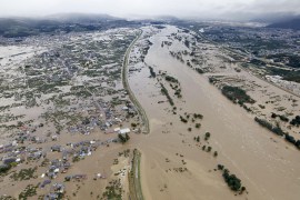 An aerial view shows residential areas flooded by the Chikuma river following Typhoon Hagibis in Nagano, central Japan, October 13, 2019, in this photo taken by Kyodo. Mandatory credit Kyodo/via REUTE