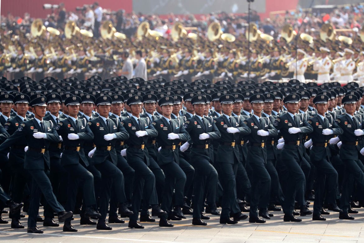Members of a Chinese military honor guard march during the the celebration to commemorate the 70th anniversary of the founding of Communist China in Beijing, Tuesday, Oct. 1, 2019. (AP Photo/Ng Han Gu