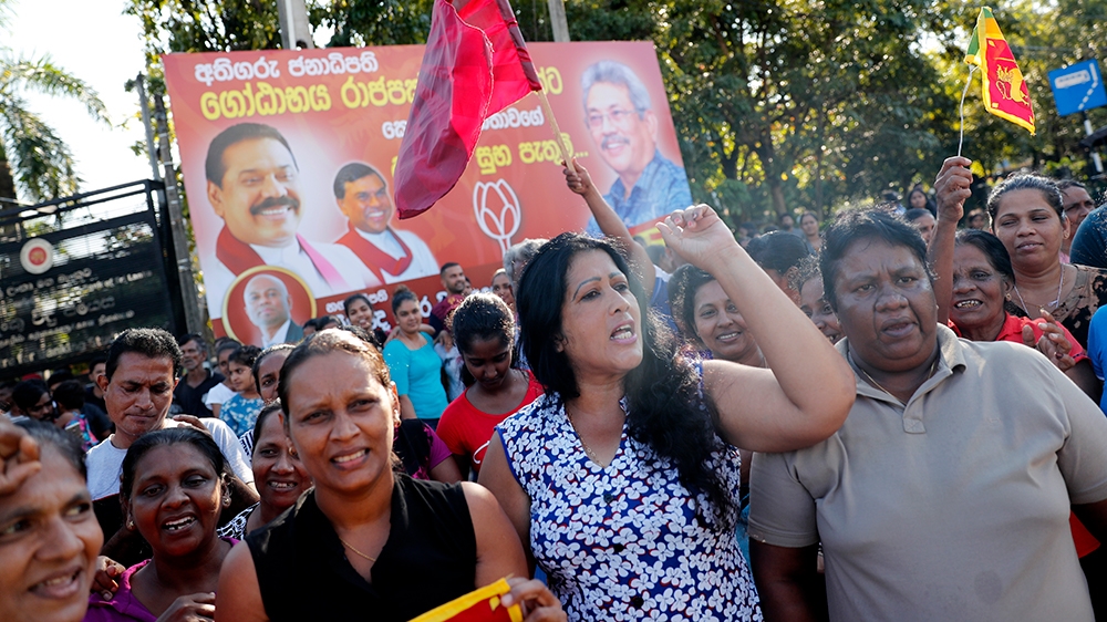 Supporters of Sri Lanka's president elect Gotabaya Rajapaksa celebrate his election victory in Colombo, Sri Lanka, Sunday, Nov.17, 2019. Rajapaksa, revered by Sri Lanka's ethnic majority for his role 