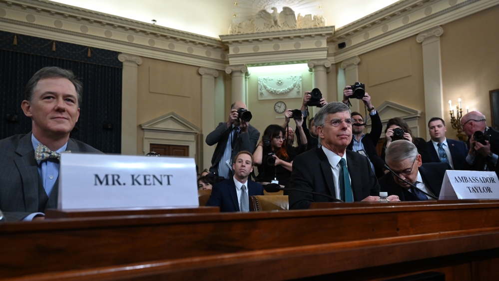 Ambassador William Taylor and Deputy Assistant Secretary George Kent(L) arrive during the first open hearings in the impeachment inquiry into US President Donald Trump in Washington, DC on November 13