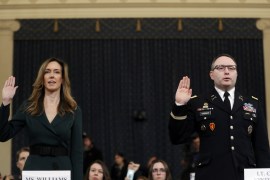 Jennifer Williams, an aide to Vice President Mike Pence, left, and National Security Council aide Lt. Col. Alexander Vindman, are sworn in to testify before the House Intelligence Committee on Capitol