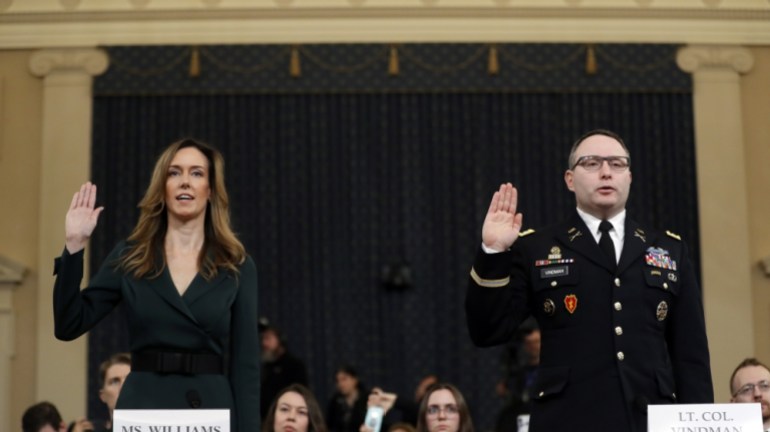 Jennifer Williams, an aide to Vice President Mike Pence, left, and the National Security Council aide Lt.  Col.  Alexander Vindman, are sworn in to testify before the House Intelligence Committee on Capitol