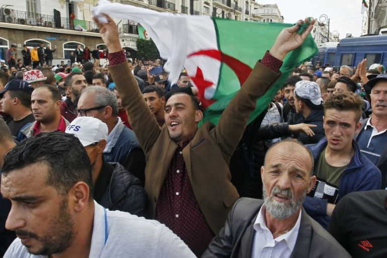 Algerian protesters chant slogans during the 37th consecutive Friday anti-government demonstrations in the capital Algiers, on November 1, 2019