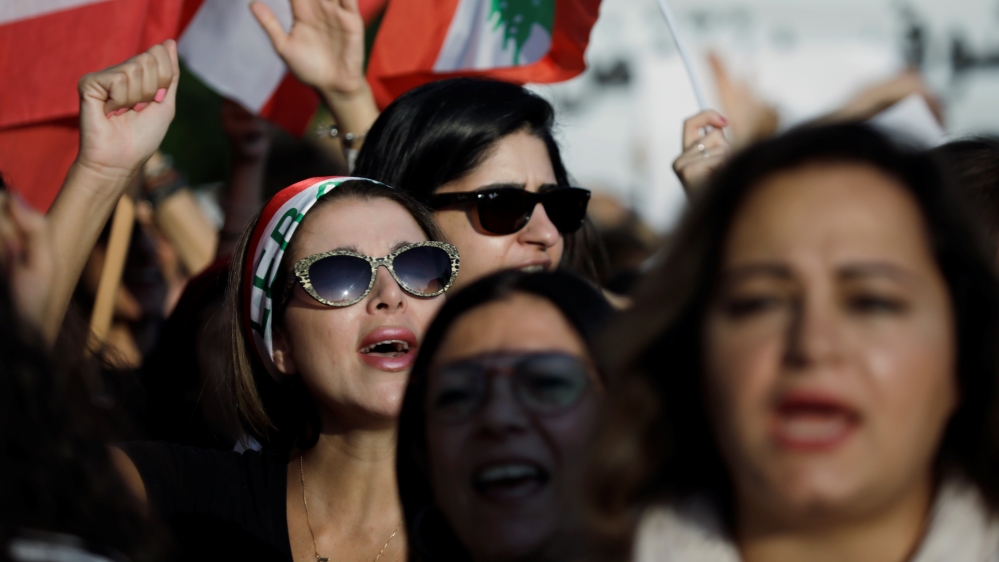 Demonstrators shout slogans at a feminist march during ongoing anti-government protests in Beirut