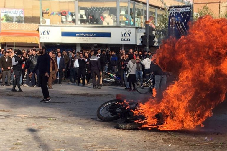 Iranian protesters clash in the streets following fuel price increase in the city of Isfahan, central Iran, 16 November 2019. Media reported that people protests in highways and in the streets after t