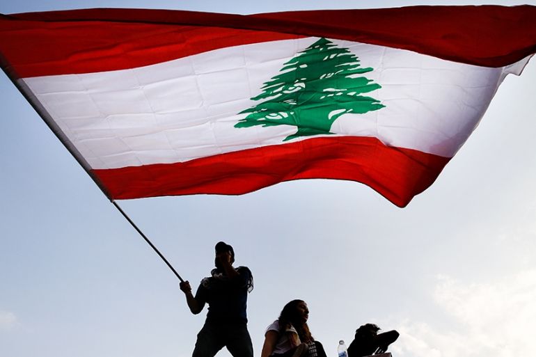 Hope, defiance as Lebanon protests enter second month
