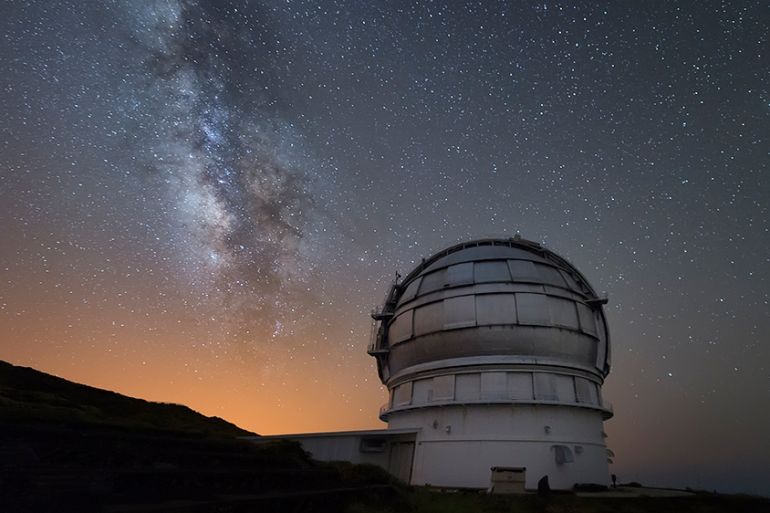 In this image released on Wednesday, July 11, 2018, the Milky Way, visible in the skies above the Gran Telescopio Canarias at the Roque de los Muchachos Observatory on the island of La Palma in the Ca