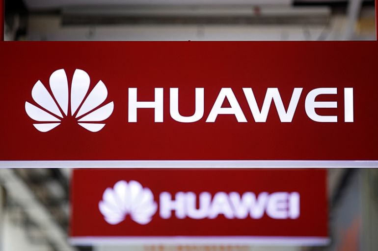 Huawei signage are pictured at a mobile phone shop in Singapore, May 21, 2019