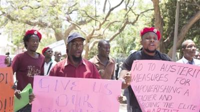 Government workers marching for better wages in the capital Harare. CHRIS MURONZI/AL JAZEERA