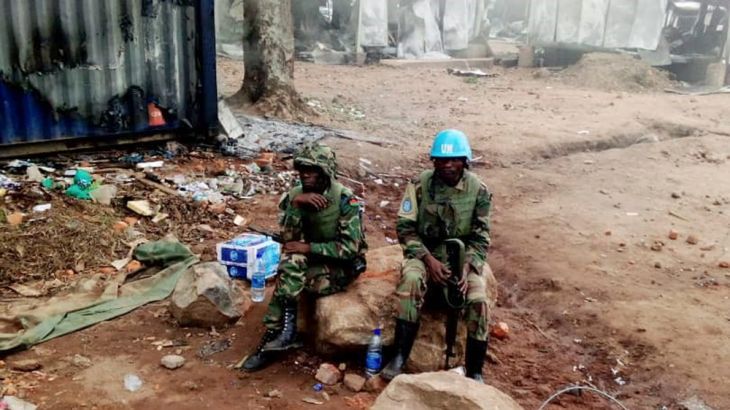 United Nation (UN) peacekeepers are seen at the UN civil base in Beni in the eastern part of the Democratic Republic of Congo on November 26, 2019. On November 25, 2019 angry demonstrators ransacked a