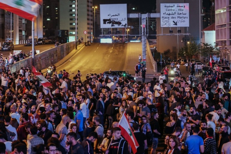 Protesters block the Ring Bridge highway in Beirut