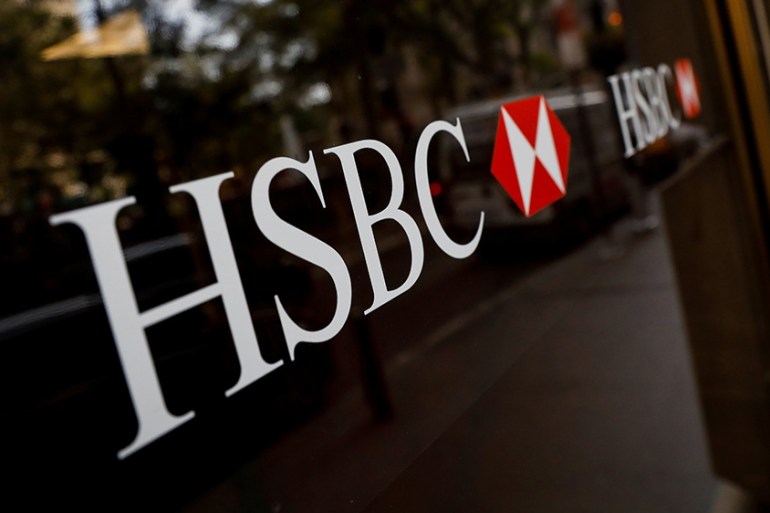 HSBC logos are seen on a branch bank in the financial district in New York, U.S., August 7, 2019