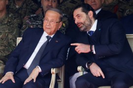 Lebanon''s caretaker Prime Minister Saad al-Hariri chats with Lebanon''s President Michel Aoun during a military parade to mark the 76th anniversary of Lebanon''s independence at