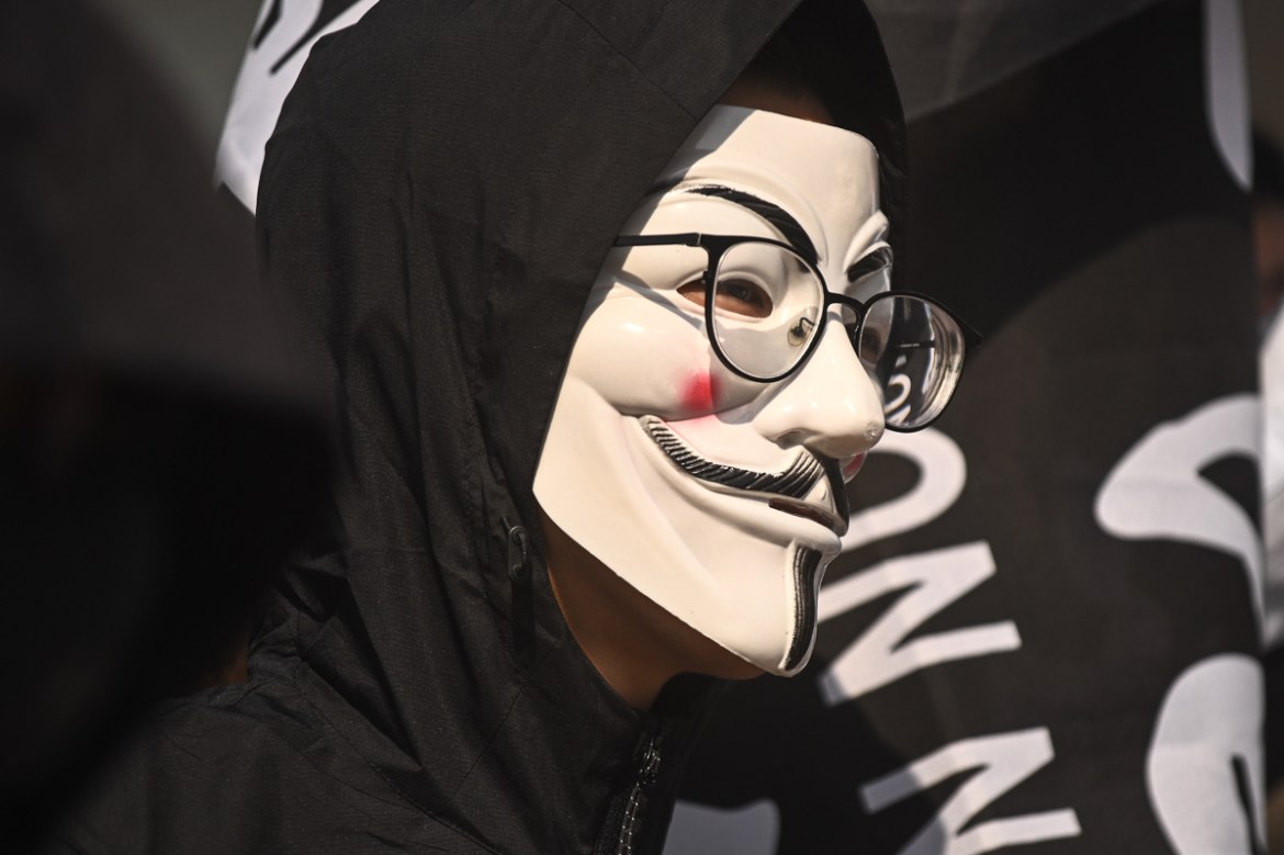 A University student wears a Guy Fawkes mask, popularised by the ''V For Vendetta'' comic book film, during an anti-government protest at a graduation ceremony at the Chinese University of Hong Kong on