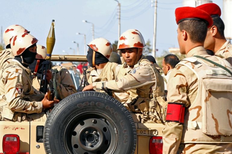 Military forces look on in North Sinai