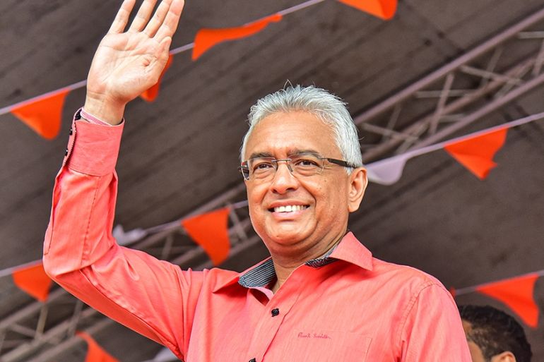 Mauritius''s Prime Minister Pravind Jugnauth of Militant Socialist Movement (MSM) party reacts to supporters during their rally allied with the Liberation Movement (ML) party for the general election i
