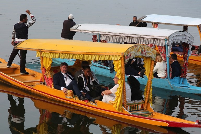 Members of European delegation enjoy local Shikara ride in world famed Dal Lake in Srinagar 29 October 2019. A 27-member European Union delegation arrived in Indian-administered Kashmir on 29 October