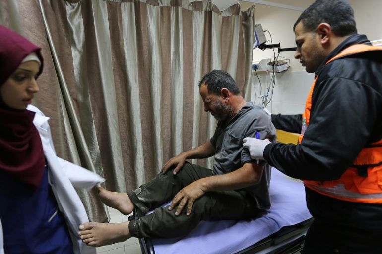 A wounded Palestinian receives treatment in a hospital following Israeli air strikes, in the southern Gaza Strip November 2, 2019