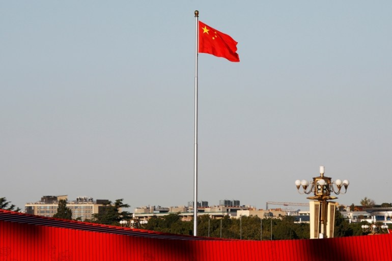 Chinese flag flutters at the Tiananmen Square in Beijing