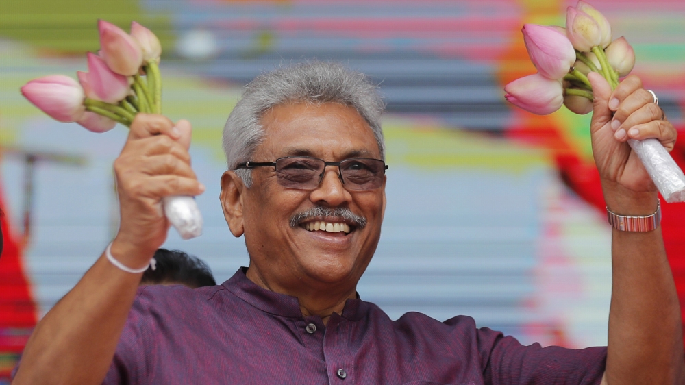 Sri Lankan presidential candidate and former defense chief Gotabaya Rajapaksa waves to his supporters during a rally in Neluwa village in Galle, Sri Lanka, Tuesday, Oct. 22, 2019. Rajapaksa is the fro