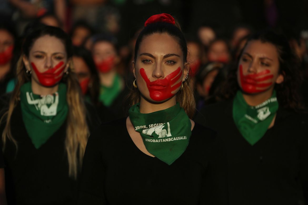 Women take part in a march to mark the International Day for the Elimination of Violence against Women, at Plaza Italia in Santiago, Chile, 25 November 2019. The International Day for the Elimination