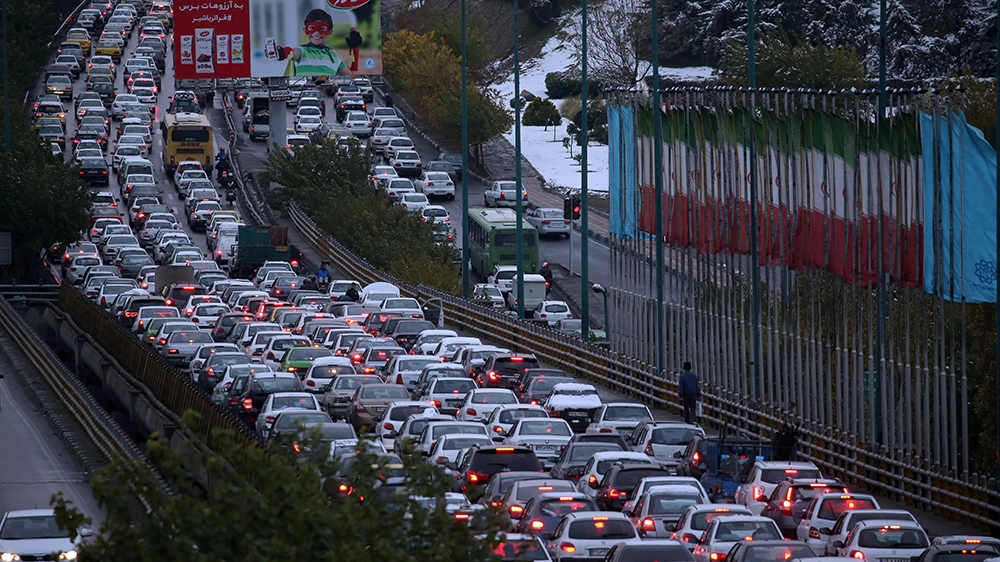 A highway is blocked by vehicles as protests block the roads following fuel price increase in Tehran, Iran, 16 November 2019.  Media reported that people protested on highways after the government inc