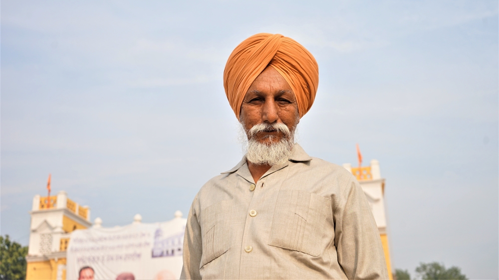 Gurmit Singh, 67, a Sikh from Chandigarh, India poses in Nankana Sahib, Pakistan on the 550th birth anniversary of Guru Nanak, Sikhism's founder