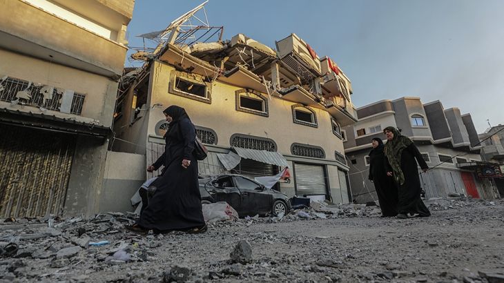 Palestinians inspect the damaged house of Islamic jihad leader Bahaa Abu al-Ata after an Israeli air strike in Gaza City, 12 November 2019. Abu al-Ata and his wife were killed after an Israeli air str