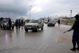 Central security support force carry weapons during the security deployment in the Tajura neighborhood, east of Tripoli