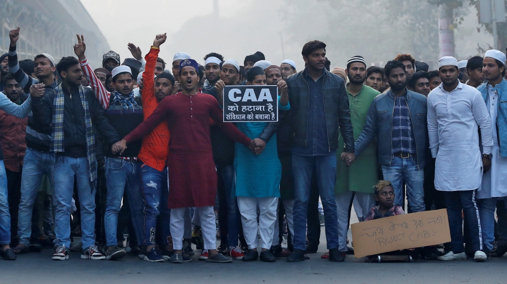 Demonstrators shout slogans during a protest against a new citizenship law in Jafrabad, an area of Delhi, India December 20, 2019