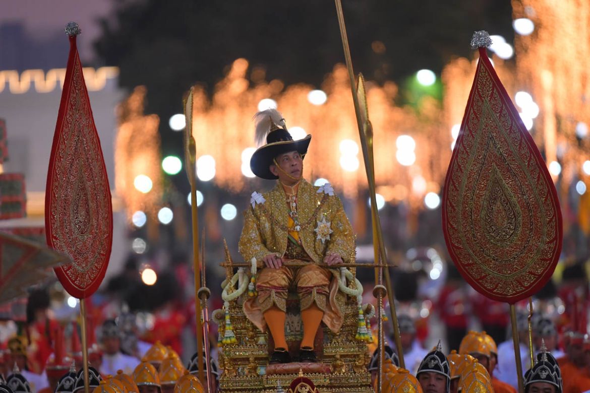 Thailand''s King Maha Vajiralongkorn is transported on the royal palanquin by royal bearers during the Royal Procession outside the Grand Palace in Bangkok, Thailand, Thursday, Dec. 12, 2019. Thousands