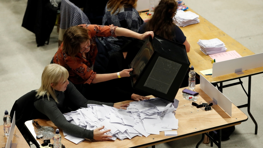 Ballots are tallied at a counting centre for Britain's general election in Brighton, Britain, December 12, 2019