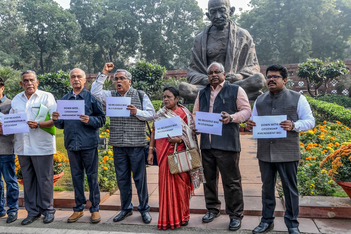 Members of Parliament (MP) from left parties shout slogans against the government''s Citizenship Amendment Bill (CAB) at the Parliament House in New Delhi on December 10, 2019. Prakash SINGH / AFP