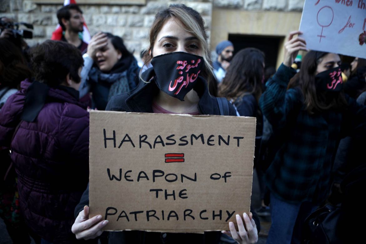 An activist takes part in a demonstration against sexual harassment, rape and domestic violence in the Lebanese capital Beirut on December 7, 2019.  Patrick BAZ / Abaad / AFP
