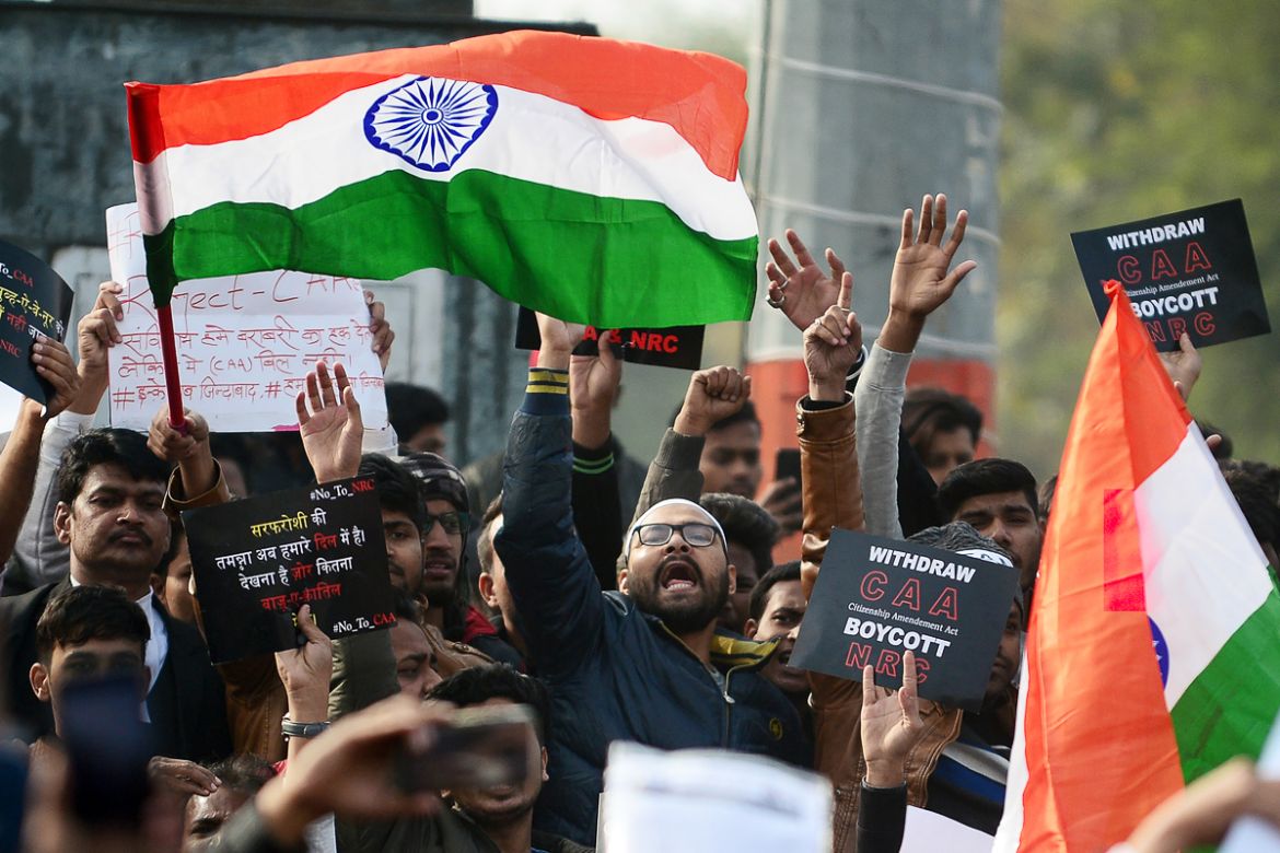 Protesters shout slogans during a demonstration against India''s new citizenship law in Allahabad on December 19, 2019. - Indians defied bans on assembly on December 19 in cities nationwide as anger sw