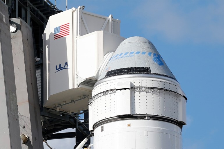 Boeing's first Starliner spacecraft - seen here on top of a United Launch Alliance Atlas 5 rocket in December 2019 - had originally planned to dock with the International Space Station for several days, but suffered a problem with its mission timer, got stranded in the wrong orbit, and came home after circling Earth for two days [File: Terry Renna/AP]
